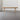 Elegant French Vintage 90-inch Cerused Oak Dining Table with Fluted Apron