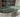 Sleek Modern Oval Dining Table Set with Verde Alpi Green Marble Top