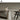 Elegant Beige Travertine Round Dining Table with Conical Leg Design